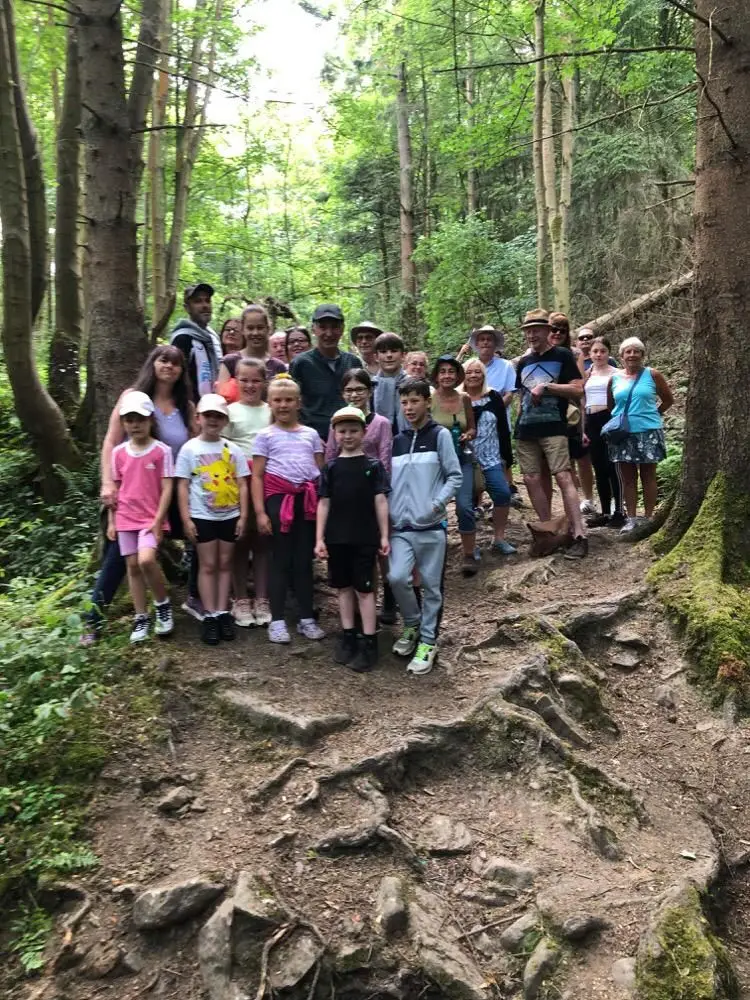 Children and adults joining in with a community event | Microsite | Microsite